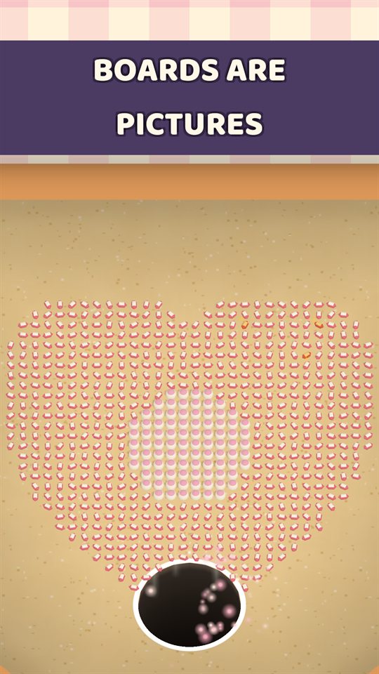 A board of sprinkles arranged into a heart